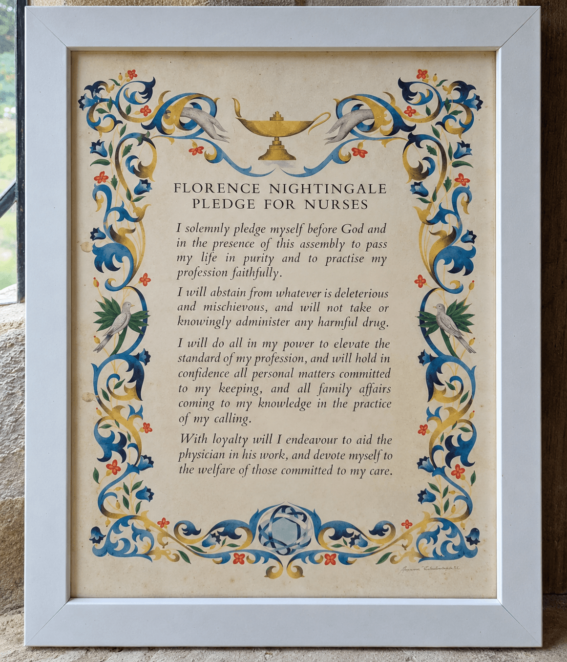 A framed display of the Nightingale Pledge for nurses.