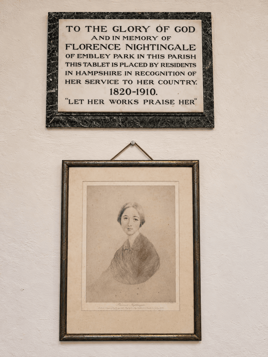 A portrait of Florence Nightingale beneath a memorial tablet honouring her service